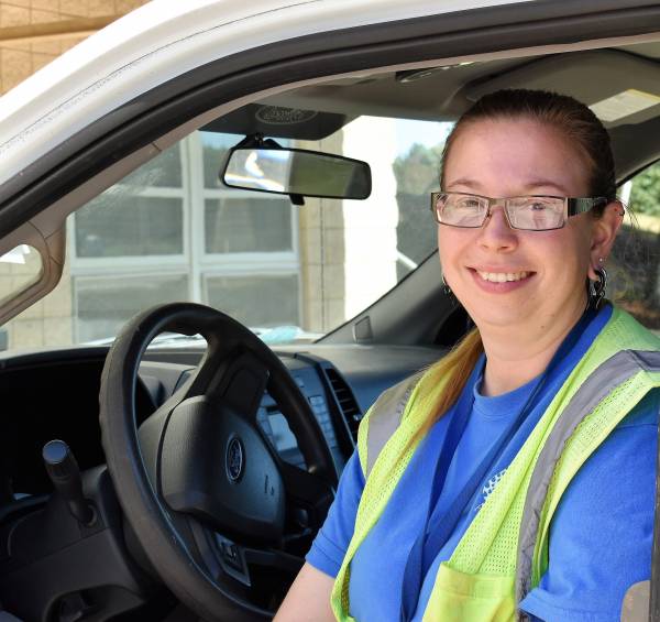 woman sitting in truck